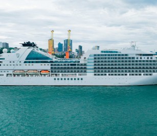 SEABOURN ENCORE cruise ship with nationality of BAHAMAS, length of 210.5 meters, width of 28 meters, and depth of 6 meters, docked safely at PAS